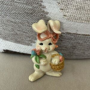 Vintage Russ miniature ceramic Bunny Hop figurine with flowers and basket